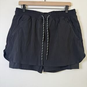 ATHLETA Trekkie Skort Size 12 Black Zip Pockets Stretch Athletic Skirt Shorts